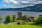 The ruins of Urquhart Castle on the shores of Loch Ness in Scotland