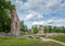 Ruins of the Viljandi Order Castle against blue sky with clouds.