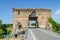 The ruins of Visconti bridge of Valeggio sul Mincio at Borghetto seen from the top of bridge, Italy