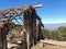 Ruins wooden shelter, Photo of old wooden framework for making tent in top of mountain