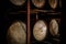 Rum or whiskey wooden barrels stacked in a warehouse