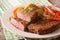 Rump steak in breadcrumbs and fresh vegetables, baked potatoes c