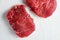 Rump steak, farm organic raw beef meat White textured background. Side view space for price