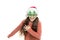 Run away. Christmas holiday. Small girl in santa hat. Having fun. Happy child christmas tree eyewear accessory booth