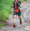 Run rain,Cross country runner,Trail running in the forest,uphill in autumn trail of mud and stones,In the north of Thailand,blur,S