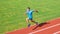 Run into shape. Running challenge for beginners. Athlete run track grass background. Sprinter training at stadium track