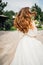 runaway bride. A beautiful woman in a white wedding dress with flowing hair