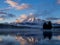 Rundle Mountain reflecting in Two Jack Lake