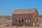 A rundown abandoned wood house in Tuba City Arizona on the Navajo reservation