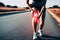 runner Expressing Knee Discomfort on the Roadside - Generative AI