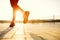 Runner feet running on road closeup on shoe.