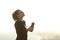 Runner girl breathing holding a bottle of water outdoors