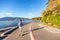 Runner girl running in Stanley Park Vancouver, British Columbia. Woman jogging in city outdoors enjoying healthy active