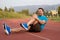 Runner with injured knee on the track