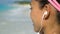 Runner Listening Music Running Exercising On Beach Putting Headhones in ear