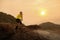 Runner on rural track with sunset or sunrise