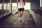 Runner sportswoman running up city stairs