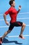 Runner sprinting towards success on run path running athletic track. Goal achievement concept. Male athlete sprinter