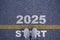 Runner standing at the starting point with 2025 year for starting in new year 2025 to achieve business planing and success concept