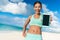 Runner woman showing smartphone fitness app screen