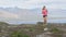 Runner woman trail running in nature run
