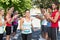 Runners applauding a racer in the park