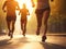 Runners\\\' legs in action on a sunlit road
