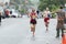 Runners passing water station