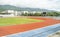 Runners racetrack surrounded by mountain