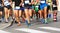 Runners run at finish line during race in the city