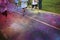 Runners running in a color run race abstract photo