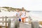 Runners. Young couple running on beach