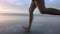 Running, beach and legs of person at night for relaxing on holiday, vacation and weekend outdoors. Nature, fitness and