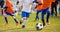 Running Children Football Soccer Players with Ball. Footballers kicking game