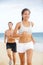 Running couple - woman fitness runner happy