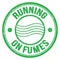 RUNNING ON FUMES text on green round postal stamp sign