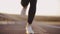 Running legs of the girl close-up, evening jog, healthy body