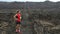 Running man - portrait of male runner resting drinking water from water bottle after cross country run on trail. Fit