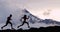 Running people athletes silhouette trail running in mountain summit background