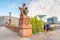 Running people in front of Moltke Bridge with scary griffins and modern steel and glass buildings and main train station Haupt