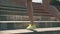 Running shoes and legs close up. Female runner athlete climbing stair outside.