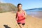 Running sports athlete runner woman on beach