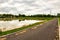 Running track with fish pond beside Kwan Phayao lake