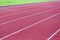 Running track and green grass,Direct athletics Running track