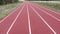 Running track with lanes. Empty outdoor running track. Athletics running track. Sport concept