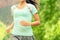 Running Woman Jogging On Sunny Day - Midsection