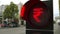 Rupee sign on red traffic light signal. Forex related conceptual 3D animation