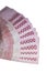 Rupiah banknotes line up like hand fans