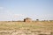 Rural Abandoned Homestead in a rural field in ukraine.