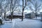 Rural America snow scene with old barns